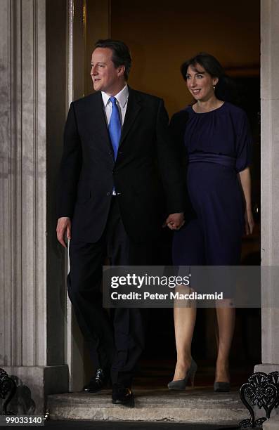 Prime Minister David Cameron and his wife Samantha leave Number 10 Downing Street on May 11, 2010 in London, England. After five days of negotiation...