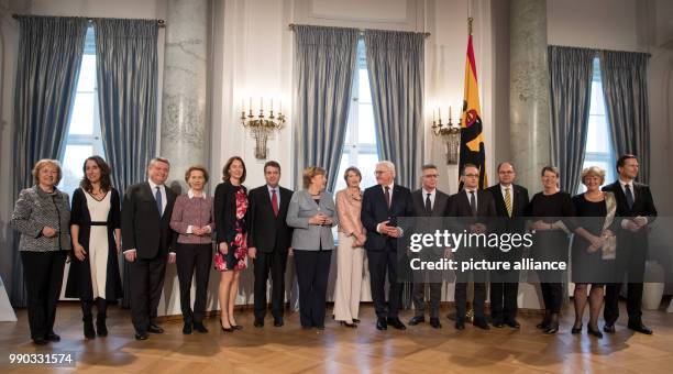 German President Frank-Walter Steinmeier and his wife Elke Buedenbender receive the members of the German parliament Maria Boehmer , State Minister...