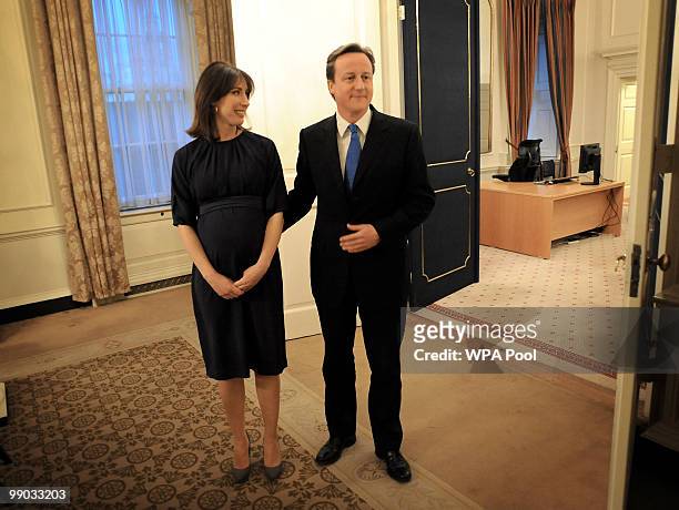 New Prime Minister David Cameron and wife Samantha seen inside 10 Downing Street after Cameron's meeting with Queen Elizabeth II on May 11, 2010 in...