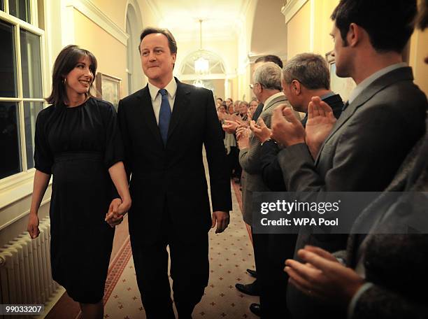 New Prime Minister David Cameron and wife Samantha seen inside 10 Downing Street after Cameron's meeting with Queen Elizabeth II on May 11, 2010 in...