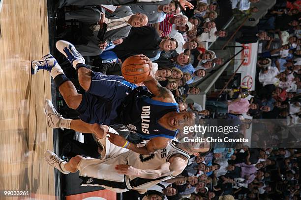 Caron Butler of the Dallas Mavericks drives against Manu Ginobili of the San Antonio Spurs in Game Six of the Western Conference Quarterfinals during...