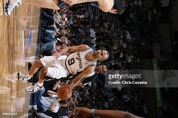 Tony Parker of the San Antonio Spurs dribbles against the Dallas Mavericks in Game Six of the Western Conference Quarterfinals during the 2010 NBA...