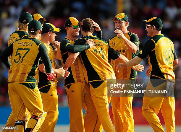Australian bowler Dirk Nannes celebrates with teammates after taking the wicket of West Indies captain Chris Gayle during the ICC World Twenty20...