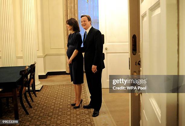 New Prime Minister David Cameron and wife Samantha seen inside 10 Downing Street after Cameron's meeting with Queen Elizabeth II on May 11, 2010 in...