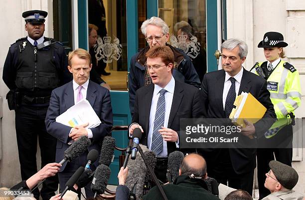 Liberal Democrats Shadow Home Secretary Chris Huhne , and Danny Alexander , Chair of the Liberal Democrats Manifesto Group, and David Laws address...