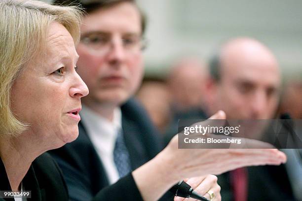 Mary Schapiro, chairwoman of the Securities and Exchange Commission , left, speaks during a Capital Markets, Insurance and Government Sponsored...