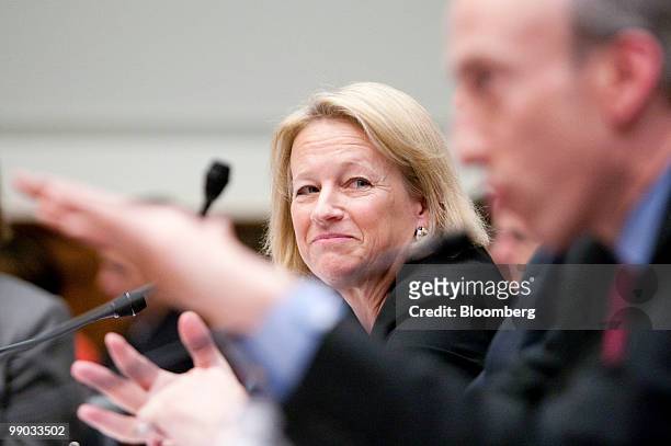 Mary Schapiro, chairwoman of the Securities and Exchange Commission , looks on as Gary Gensler, chairman of the Commodity Futures Trading Commission...
