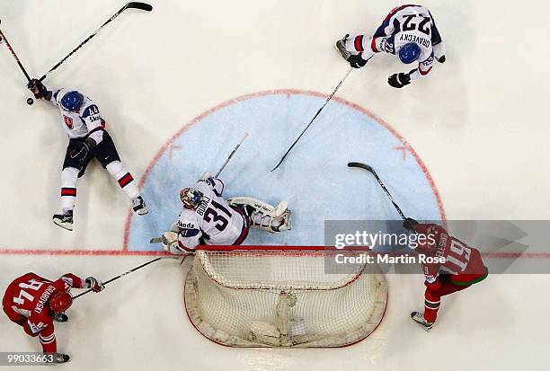Andrej Sekera of Slovakia struggles during the IIHF World Championship group A match between Belarus and Slovakia at Lanxess Arena on May 11, 2010 in...