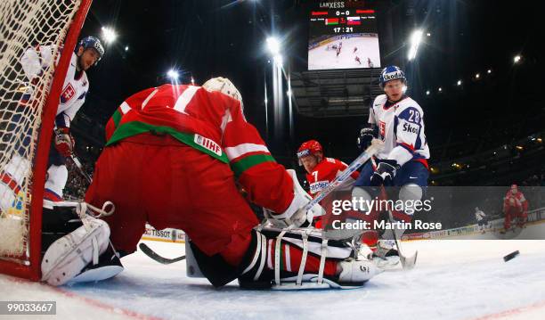 Vitali Koval goalkeeper of Belarus saves the shot of Richard Panik of Slovakia during the IIHF World Championship group A match between Belarus and...