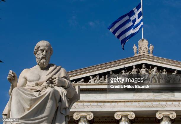 Statue of the ancient Greek philosopher Plato stands outside the Athens Academy, one of the city's modern landmarks, on May 11, 2010 in central...