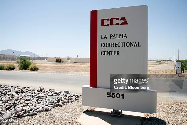 Signage stands outside the La Palma Correctional Center in Eloy, Arizona, U.S., on Tuesday, May 11, 2010. La Palma, which houses about 2,900 convicts...