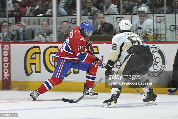 Subban of the Montreal Canadiens skates with the puck in front of Kris Letang of the Pittsburgh Penguins in Game Four of the Eastern Conference...