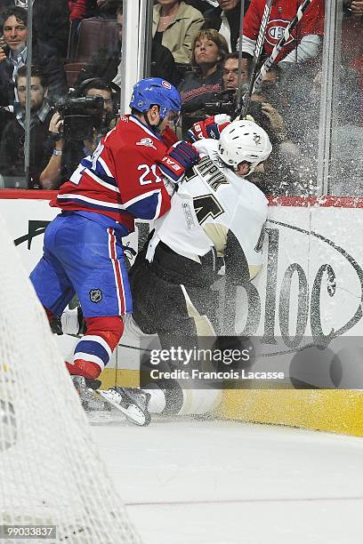 Brian Gionta of Montreal Canadiens collides with Brooks Orpik of the Pittsburgh Penguins in Game Four of the Eastern Conference Semifinals during the...