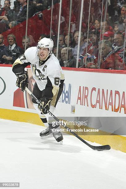 Sidney Crosby of the Pittsburgh Penguins takes a shot in Game Four of the Eastern Conference Semifinals against the Montreal Canadiens during the...