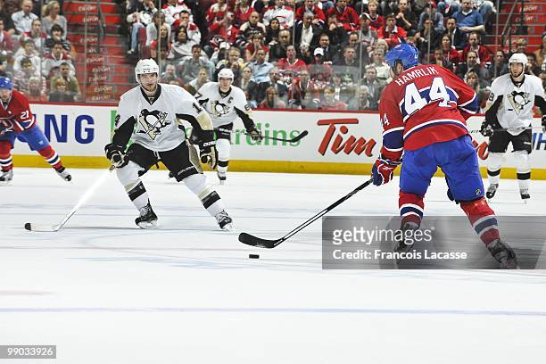 Roman Hamrlik of Montreal Canadiens skates with the puck in Game Four of the Eastern Conference Semifinals against the Pittsburgh Penguins during the...