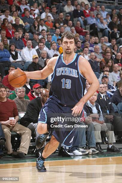 Mehmet Okur of the Utah Jazz drives the ball against the Milwaukee Bucks on March 12, 2010 at the Bradley Center in Milwaukee, Wisconsin. NOTE TO...