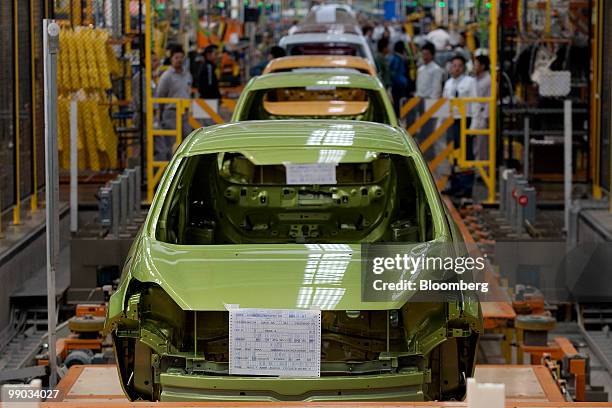 Partially built Ford Fiestas move down the assembly line at the Ford Motor Co. Plant in Cuautitlan Izcalli, Mexico, on Tuesday, May 11, 2010. Ford...