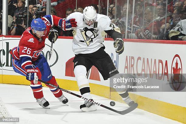 Josh Gorges of Montreal Canadiens battles for the puck with Evgeni Malkin of the Pittsburgh Penguins in Game Four of the Eastern Conference...