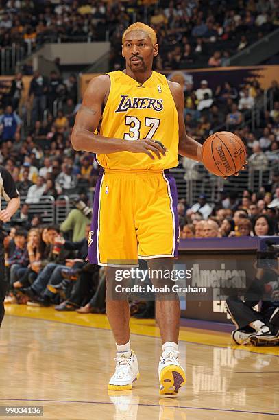 Ron Artest of the Los Angeles Lakers dribbles the bal against the Sacramento Kings at Staples Center on April 13, 2010 in Los Angeles, California....