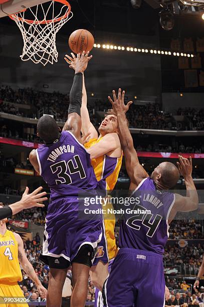 Pau Gasol of the Los Angeles Lakers puts a shot up against Jason Thompson of the Sacramento Kings at Staples Center on April 13, 2010 in Los Angeles,...