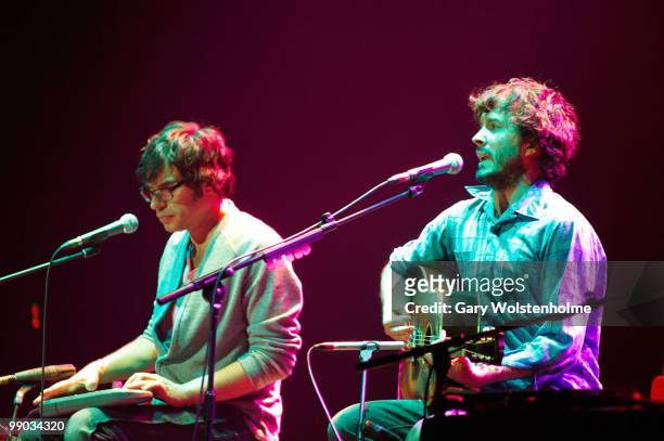 Jemaine Clement and Bret McKenzie of Flight Of The Conchords perform on stage at Manchester Apollo on May 11, 2010 in Manchester, England.