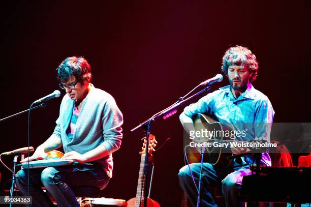 Jemaine Clement and Bret McKenzie of Flight Of The Conchords perform on stage at Manchester Apollo on May 11, 2010 in Manchester, England.