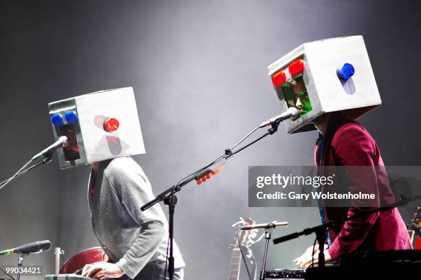 Jemaine Clement and Bret McKenzie of Flight Of The Conchords perform on stage at Manchester Apollo on May 11, 2010 in Manchester, England.