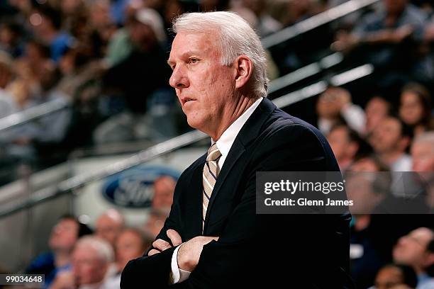 Head coach Gregg Popovich of the San Antonio Spurs watches the action against the Dallas Mavericks in Game Five of the Western Conference...