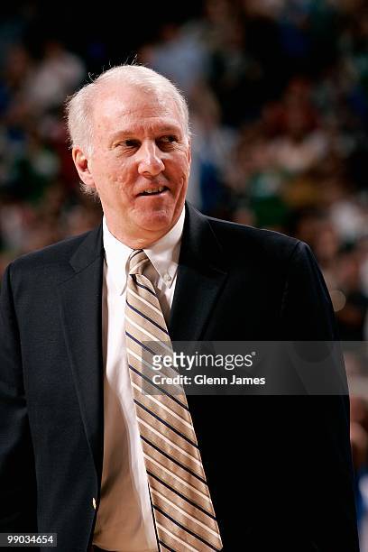 Head coach Gregg Popovich of the San Antonio Spurs smiles during the game against the Dallas Mavericks in Game Five of the Western Conference...