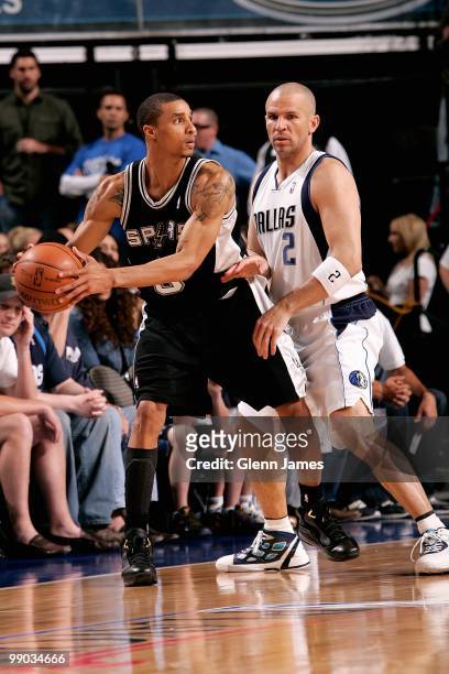 George Hill of the San Antonio Spurs looks to pass over Jason Kidd of the Dallas Mavericks in Game Five of the Western Conference Quarterfinals...