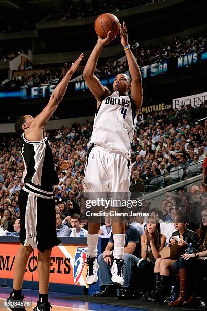 Caron Butler of the Dallas Mavericks shoots over George Hill of the San Antonio Spurs in Game Five of the Western Conference Quarterfinals during the...