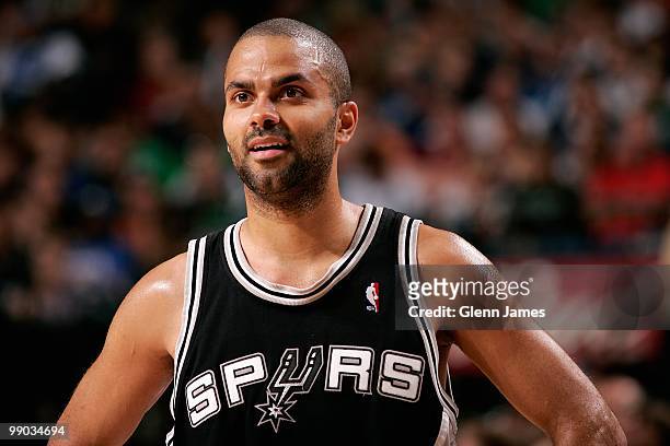 Tony Parker of the San Antonio Spurs smiles in Game Five of the Western Conference Quarterfinals against the Dallas Mavericks during the 2010 NBA...