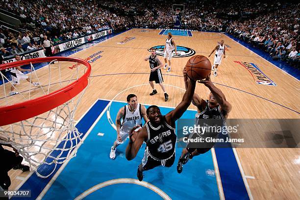 DeJuan Blair and Richard Jefferson of the San Antonio Spurs go after a rebound against the Dallas Mavericks in Game Five of the Western Conference...