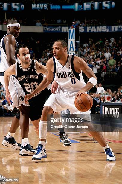 Shawn Marion of the Dallas Mavericks drives past Manu Ginobili of the San Antonio Spurs in Game Five of the Western Conference Quarterfinals during...
