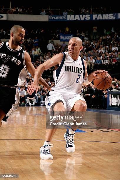 Jason Kidd of the Dallas Mavericks moves the ball away from Tony Parker of the San Antonio Spurs in Game Five of the Western Conference Quarterfinals...