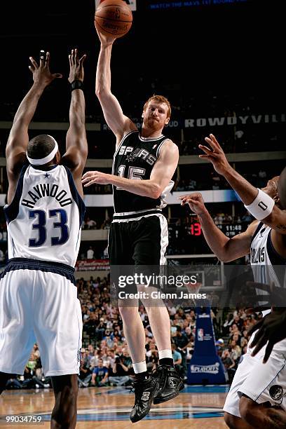 Matt Bonner of the San Antonio Spurs looks to pass over Brendan Haywood of the Dallas Mavericks in Game Five of the Western Conference Quarterfinals...