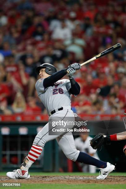 Avisail Garcia of the Chicago White Sox hits a solo home run in the eighth inning against the Cincinnati Reds at Great American Ball Park on July 2,...