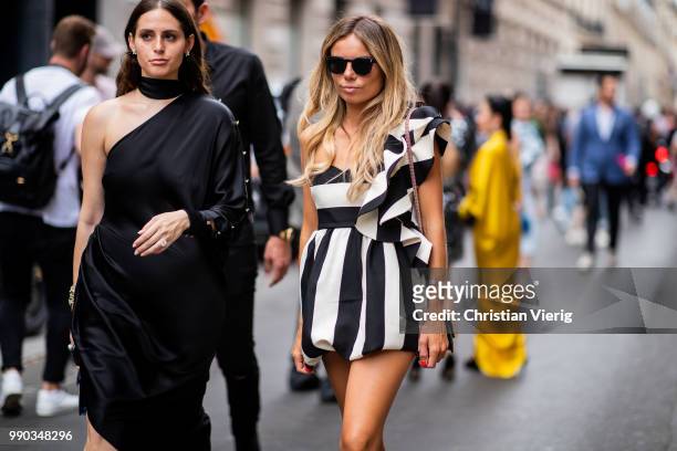 Erica Pelosini wearing black white striped dress, Valentino bag is seen outside Ralph & Russo on day two during Paris Fashion Week Haute Couture FW18...