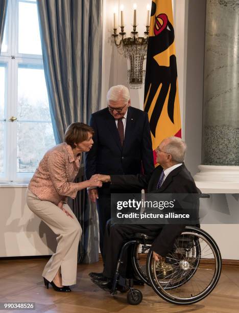 German President Frank-Walter Steinmeier and his wife Elke Buedenbender receive the president of the German Bundestag Wolfgang Schaeuble during the...