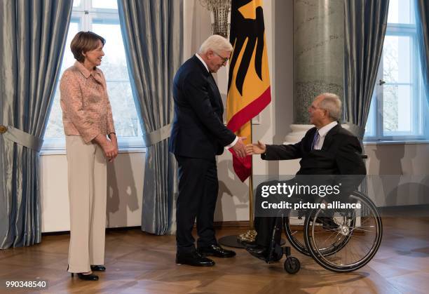 German President Frank-Walter Steinmeier and his wife Elke Buedenbender receive the president of the German Bundestag Wolfgang Schaeuble during the...