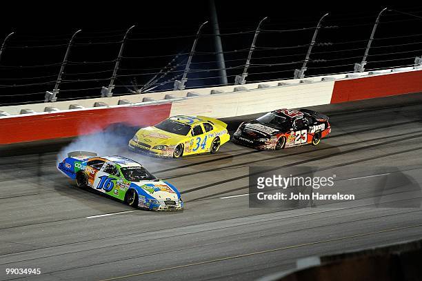 Matt Kenseth, driver of the Coupons.com Ford spins out during the NASCAR Nationwide series Royal Purple 200 presented by O'Reilly Auto Parts at...