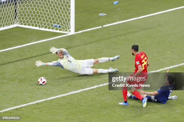 Belgium's Nacer Chadli scores the winner past Japan goalkeeper Eiji Kawashima in stoppage time of a World Cup round-of-16 match in Rostov-On-Don,...
