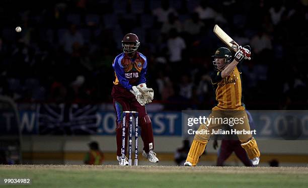 Denesh Ramdin of the West Indies looks on as Brad Haddin hits out during the ICC World Twenty20 Super Eight match between the West Indies and...