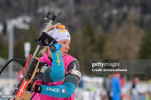 Marie Dorin-Habert from France in action at the shooting range during a training session at the Biathlon World Cup in the Chiemgau Arena in...