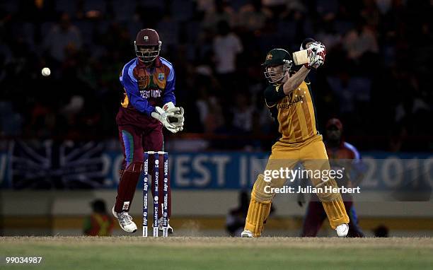 Denesh Ramdin of the West Indies looks on as Brad Haddin hits out during the ICC World Twenty20 Super Eight match between the West Indies and...