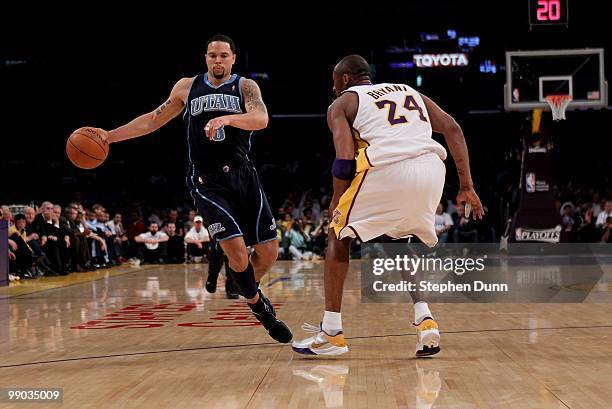 Deron Williams of the Utah Jazz controls the ball against Kobe Bryant of the Los Angeles Lakers during Game One of the Western Conference Semifinals...