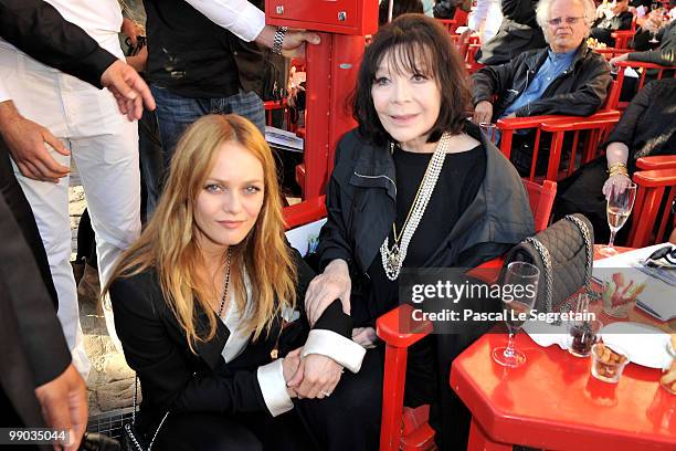 Singers Vanessa Paradis and Juliette Greco attend the Chanel Cruise Collection Presentation on May 11, 2010 in Saint-Tropez, France.