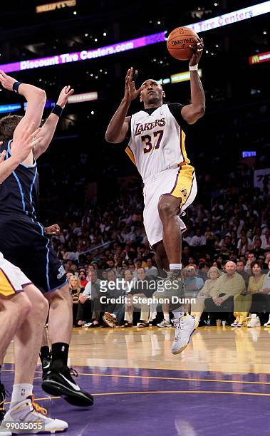 Ron Artest of the Los Angeles Lakers shoots against the Utah Jazz during Game One of the Western Conference Semifinals of the 2010 NBA Playoffs on...