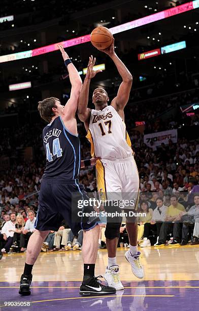 Andrew Bynum of the Los Angeles Lakers shoots over Kyrylo Fesenko of the Utah Jazz during Game One of the Western Conference Semifinals of the 2010...