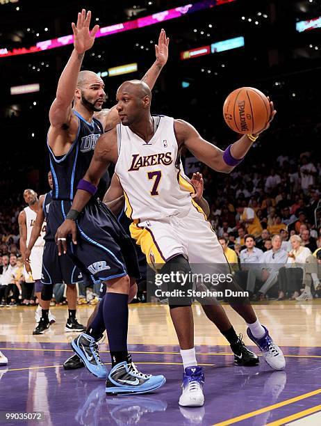 Lamar Odom of the Los Angeles Lakers looks to pass the ball against Carlos Boozer of the Utah Jazz during Game One of the Western Conference...